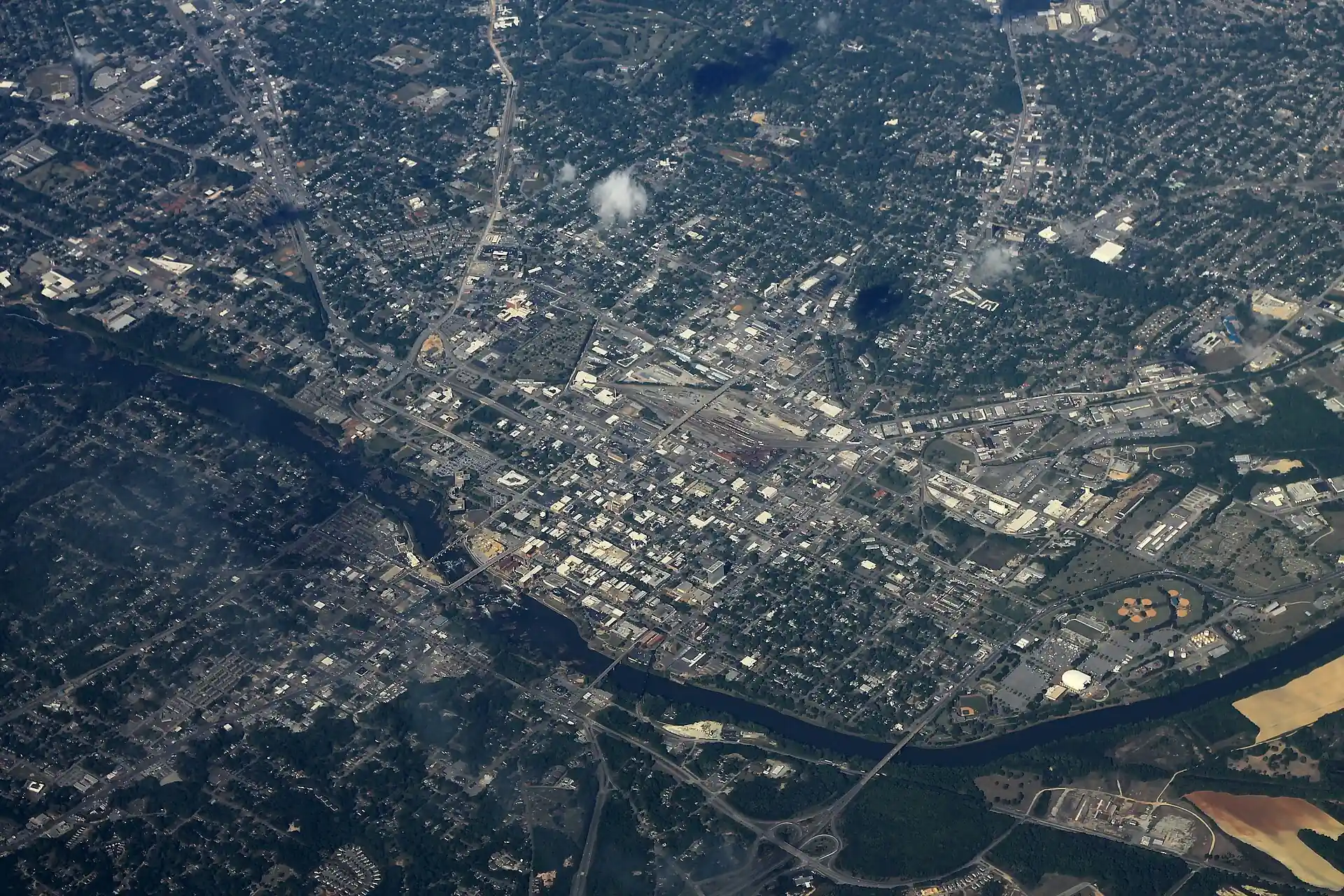 Uptown Columbus and, across the Chattahoochee River, Phenix City, Alabama, from the air.
