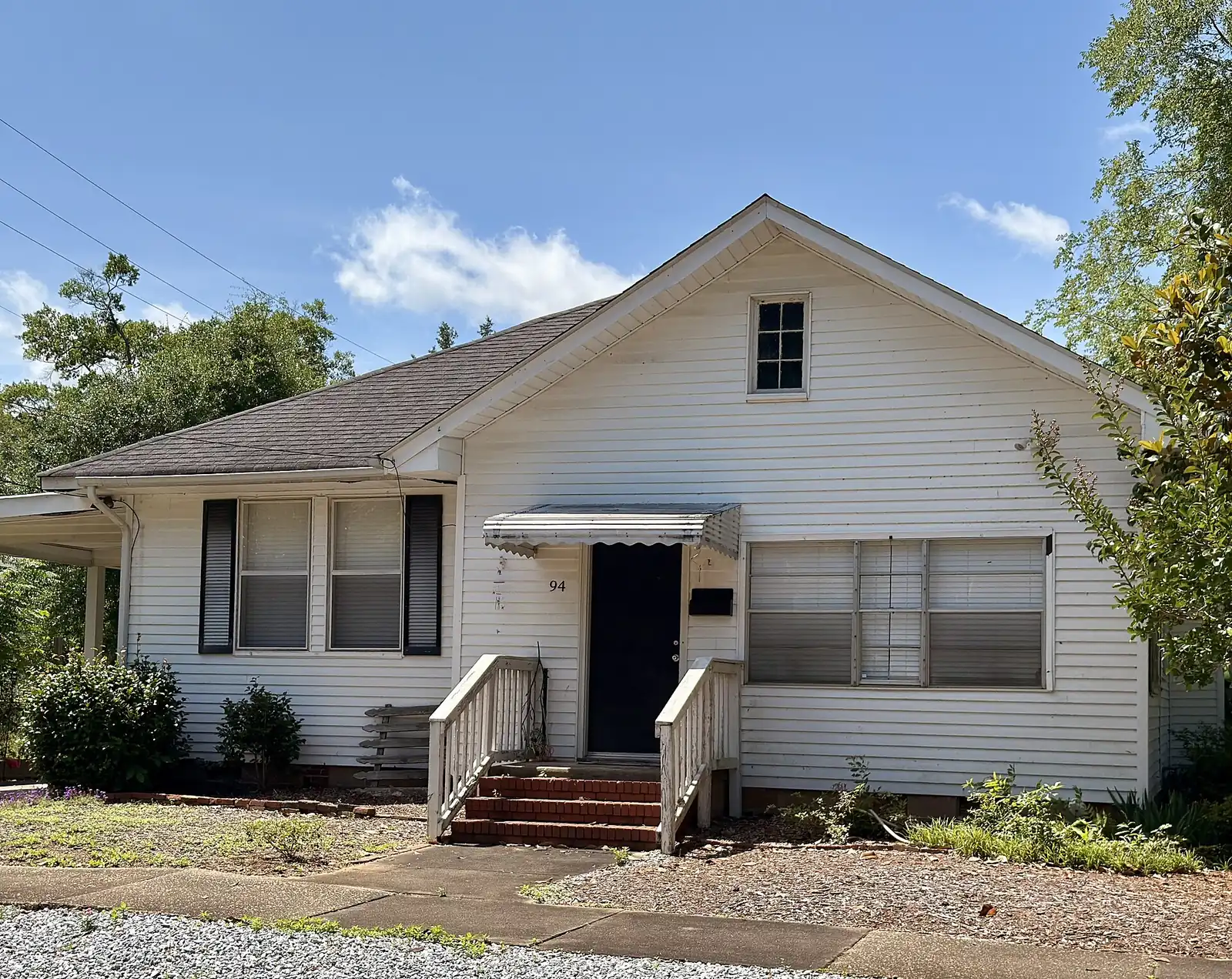 A white frame mill house in the Bibb City Historic District in Columbus.