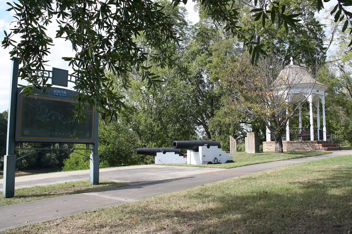 A gazebo, cannon and trail sign on the south trail of the Chattahoochee RiverWalk in Columbus.
