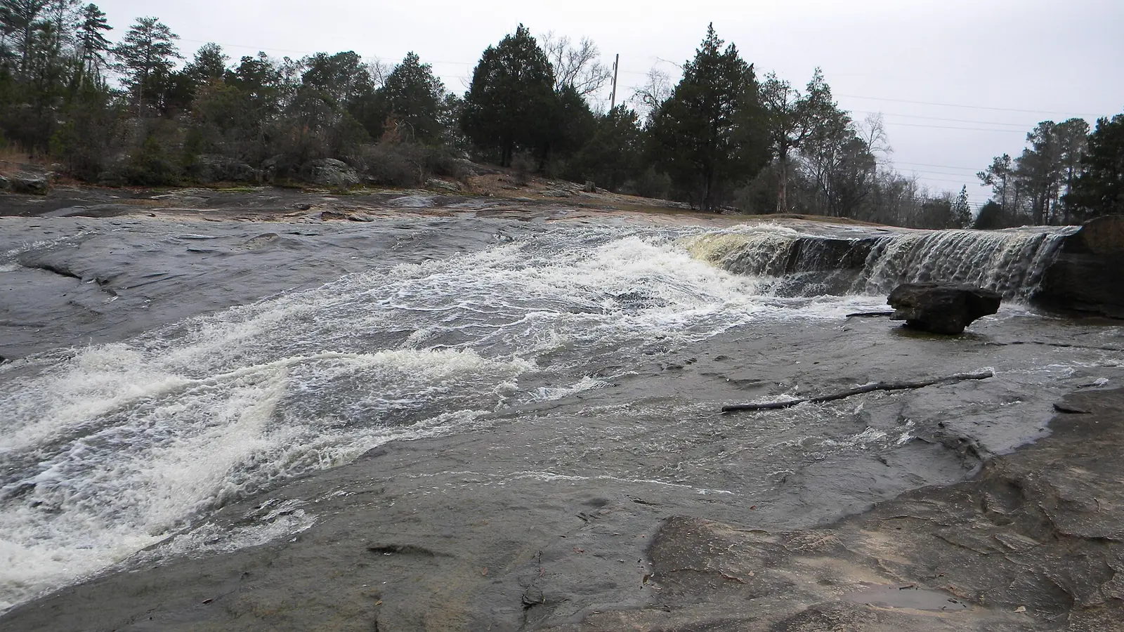 A small waterfall over the rocks at Flat Rock Park in Columbus.