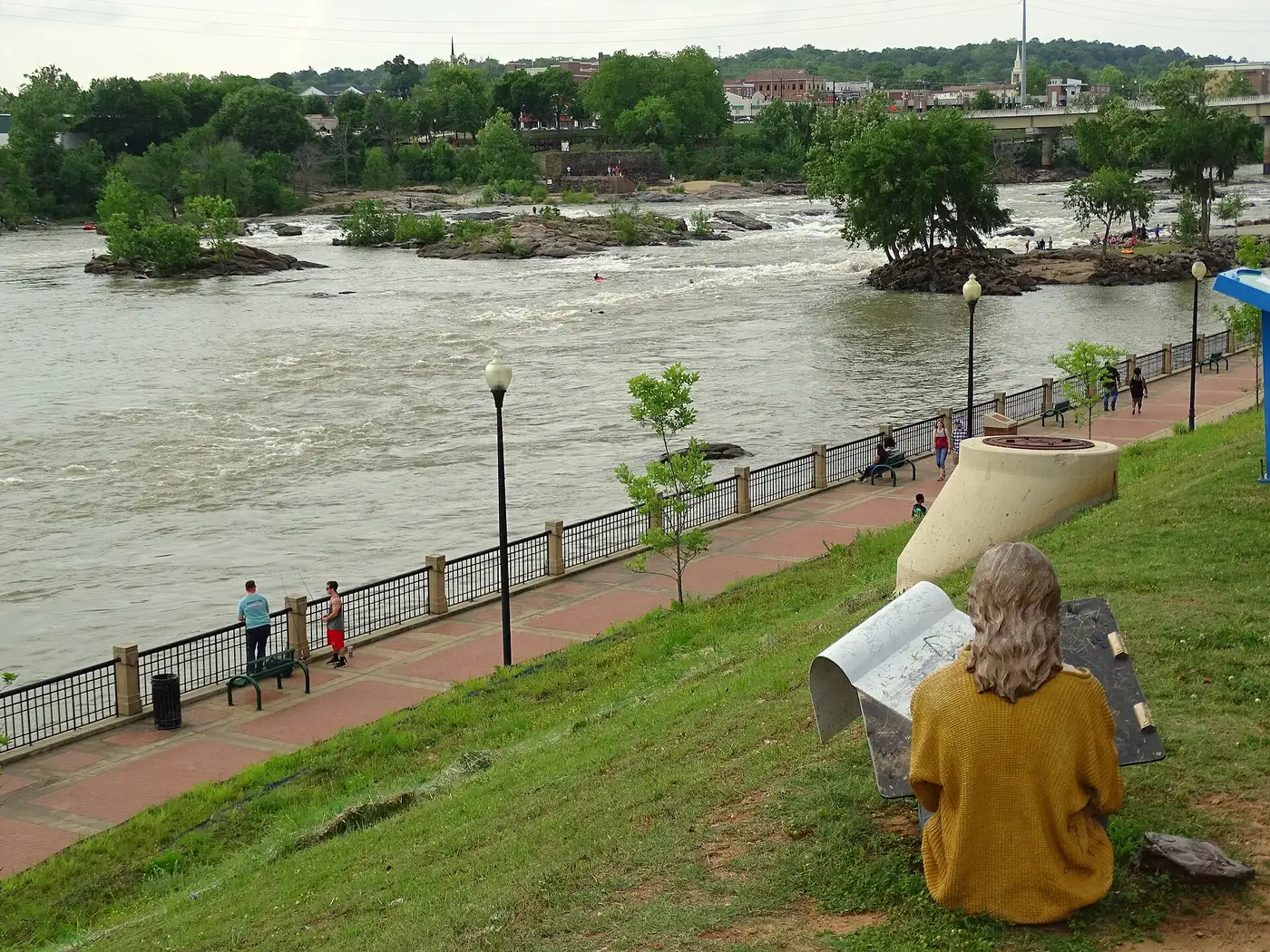 The Chattahoochee RiverWalk in Uptown Columbus beside the river's rapids.